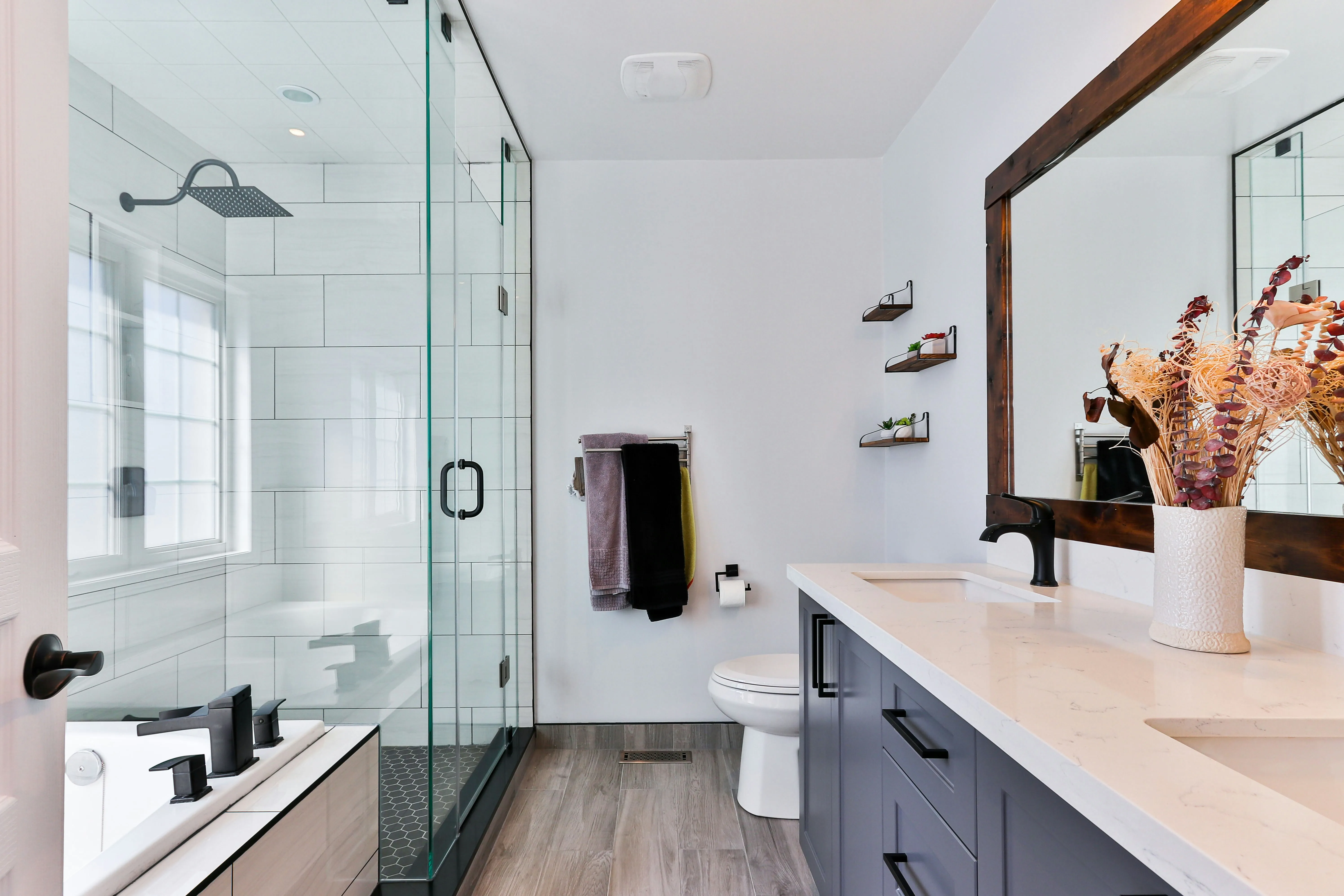 A sparkling clean bathroom with a glass shower