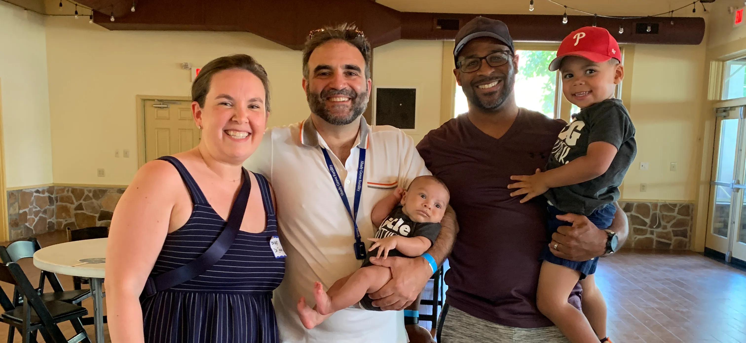 Dannie and Bridget Evans with their two sons and Dr. Sasson